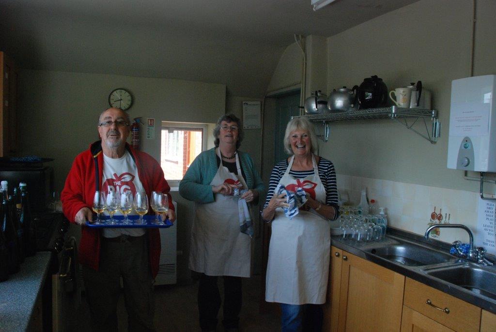 3 volunteers helping at the Cider Trials